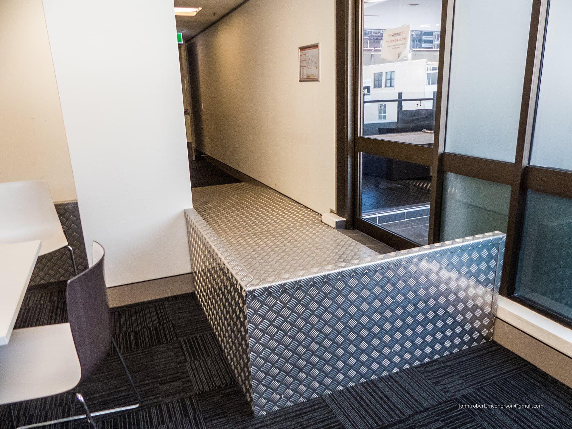 Raised-lug chequer plate steel sheet showing the patterned tread surface